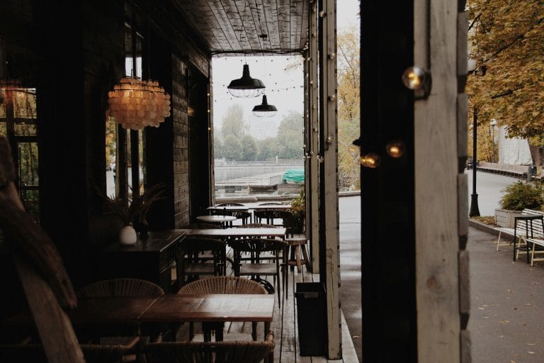 an image from inside a cafe revealing a waterbody on other side